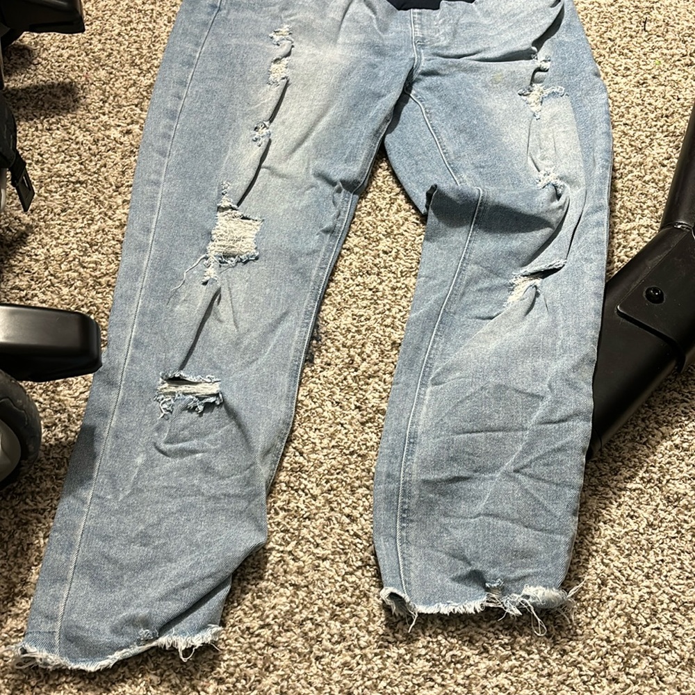 Iight washed distressed maternity jeans.